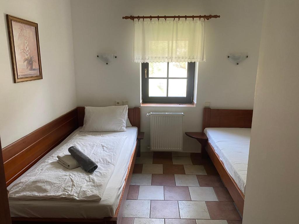 Postel nebo postele na pokoji v ubytování Penzion Janata