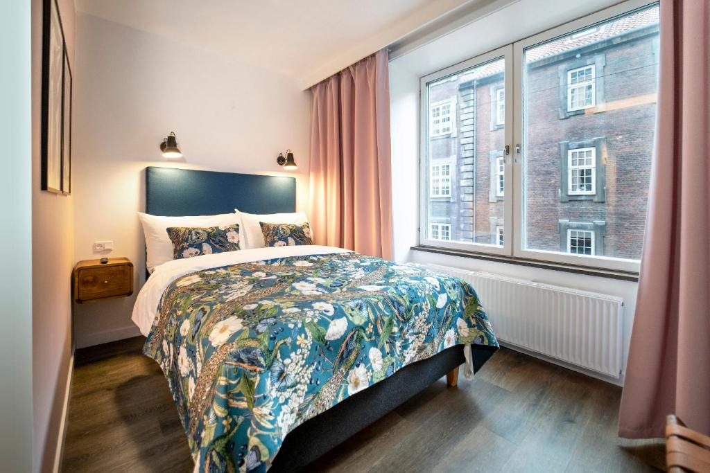 Postel nebo postele na pokoji v ubytování Motel One Copenhagen