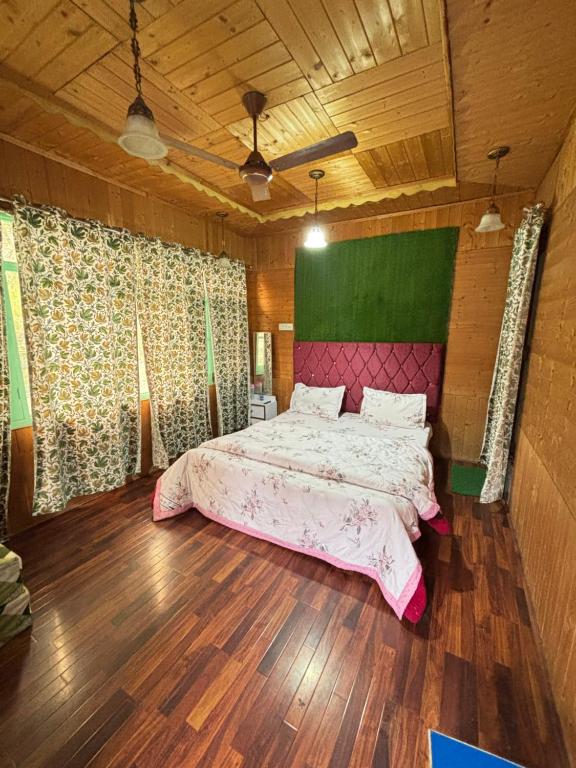Postel nebo postele na pokoji v ubytování Dal Fog Guest House