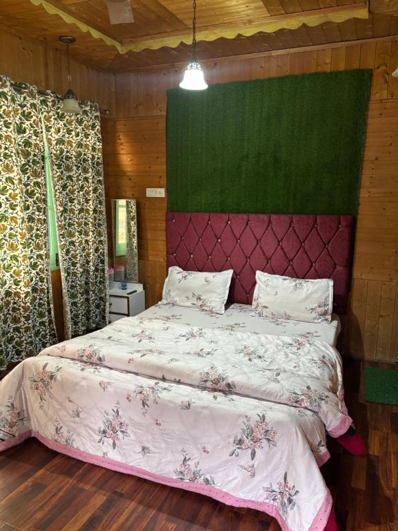 Postel nebo postele na pokoji v ubytování Dal Fog Guest House