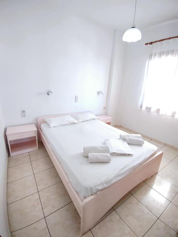 Postel nebo postele na pokoji v ubytování Captain Michalis Apartments - 750m from Kalamaki Beach
