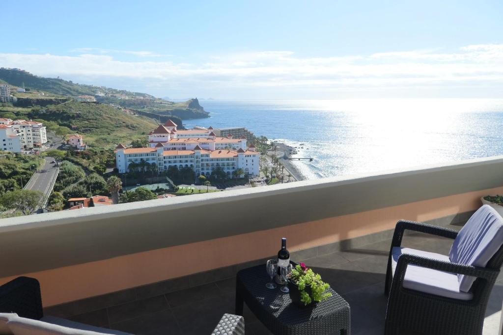 a view of the ocean from the balcony of a hotel at Aylevarroo Penthouse in Caniço