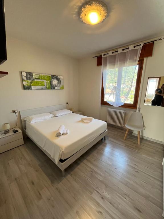 Postel nebo postele na pokoji v ubytování B&B Garzola