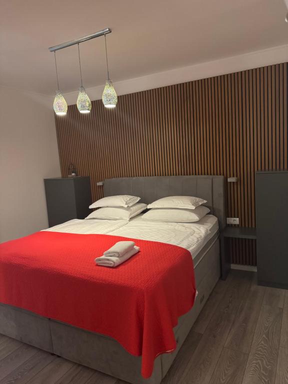 Postel nebo postele na pokoji v ubytování Palace Wall Residences