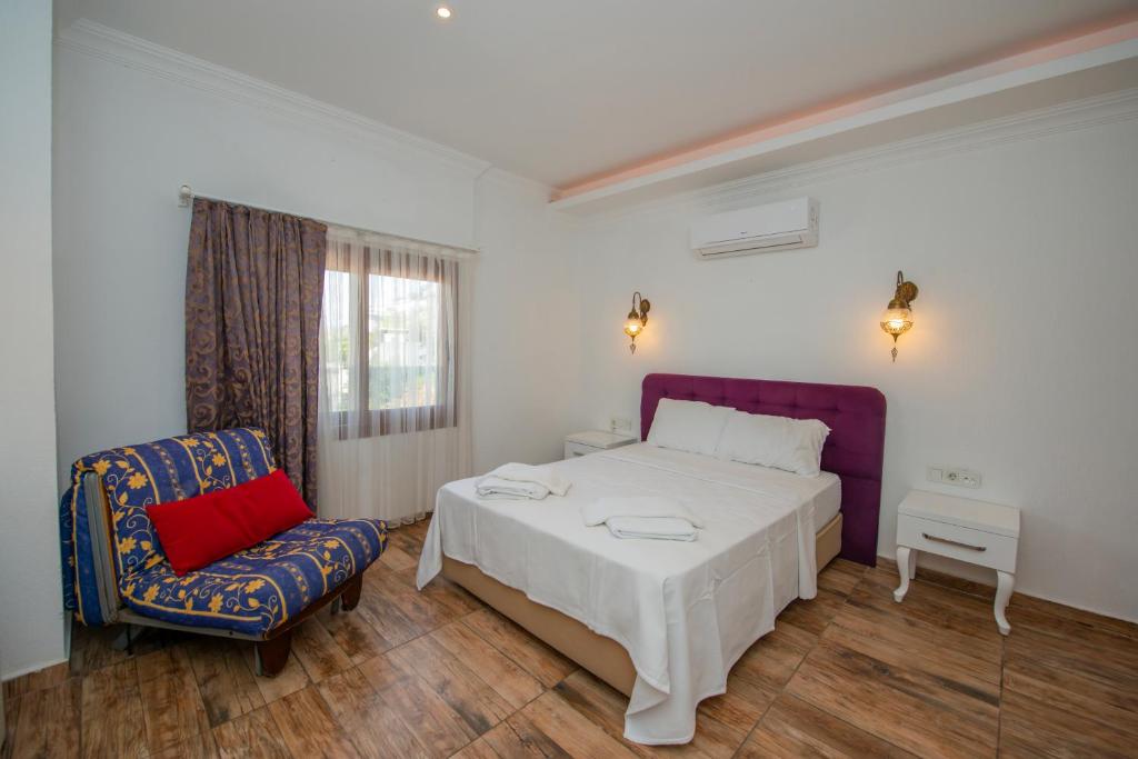 Postel nebo postele na pokoji v ubytování Cennet Life Hotel