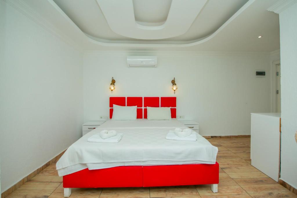 Postel nebo postele na pokoji v ubytování Cennet Life Hotel