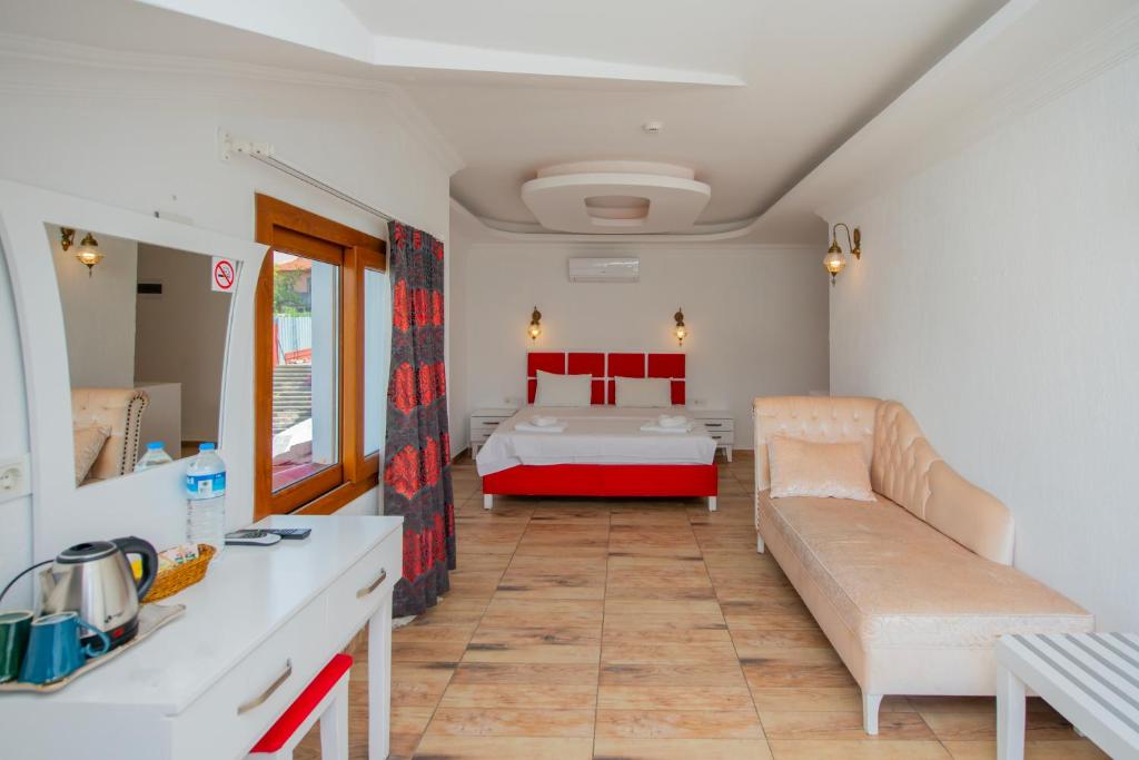 Postel nebo postele na pokoji v ubytování Cennet Life Hotel