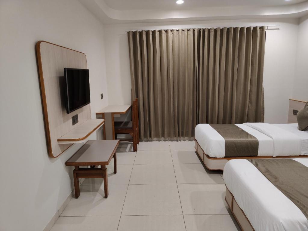 TV a/nebo společenská místnost v ubytování Hotel Kozar