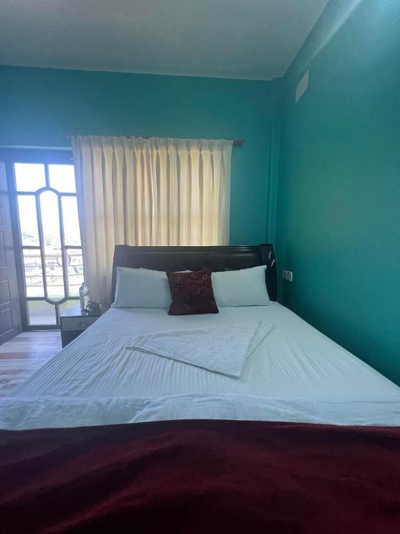 Postel nebo postele na pokoji v ubytování Hotel Mina's dreams