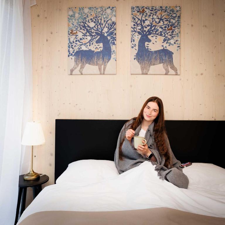 Postel nebo postele na pokoji v ubytování ŠTVRTÁ VODA - Apartmán SMREKOVICA Demänovská Dolina