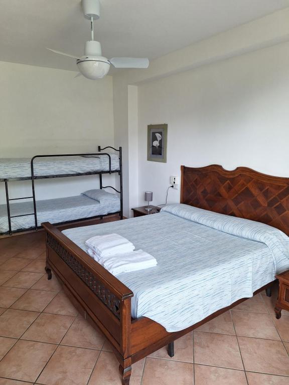 Postel nebo postele na pokoji v ubytování Agriturismo Al Motto