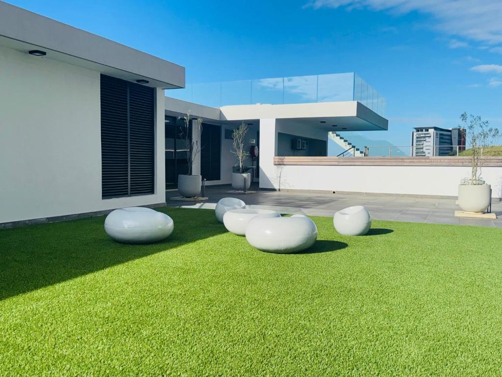 Κήπος έξω από το Umhlanga Ridge Sea View Studio Apartment