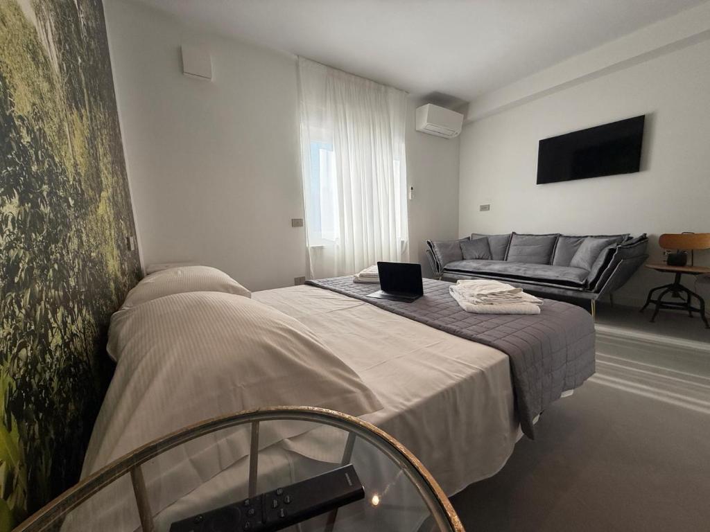 Postel nebo postele na pokoji v ubytování B&B Relax Rooms - Villa Segala