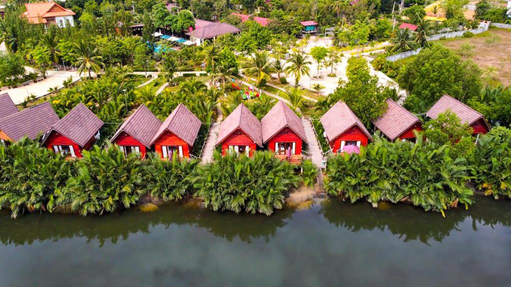 an aerial view of a resort in the water at Lodge Moni Essara Kampot in Kampot