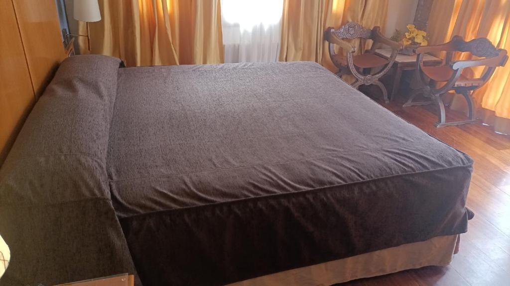 Postel nebo postele na pokoji v ubytování Hotel Albarracín