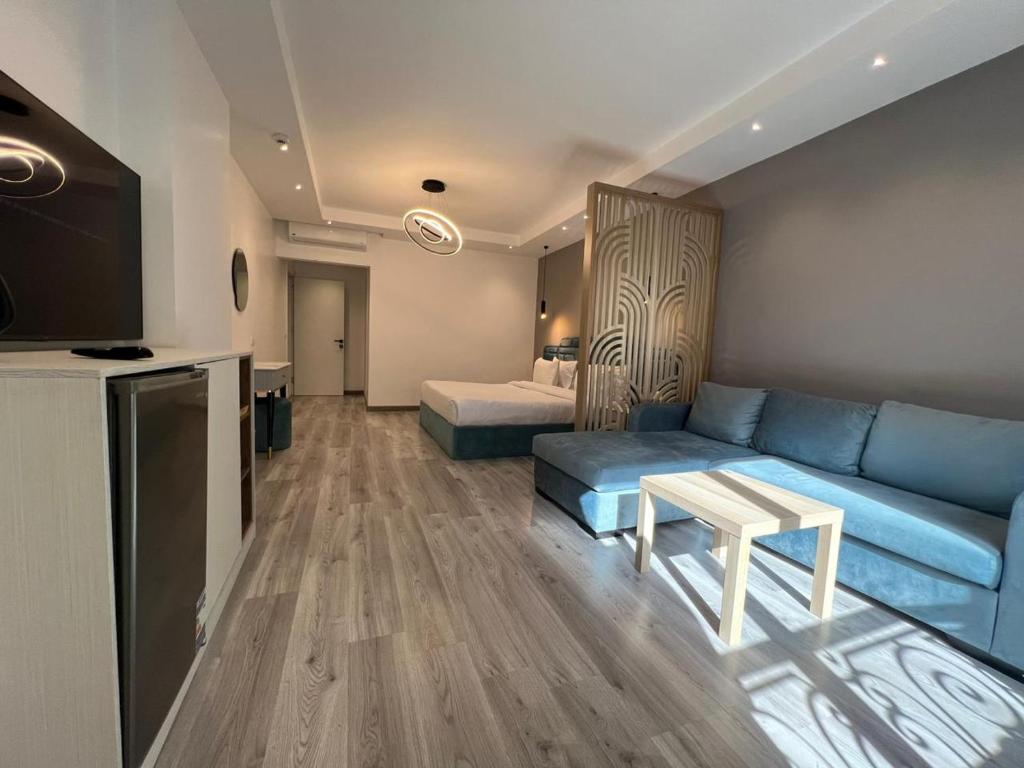 Postel nebo postele na pokoji v ubytování Onyx Pyramids Boutique Hotel