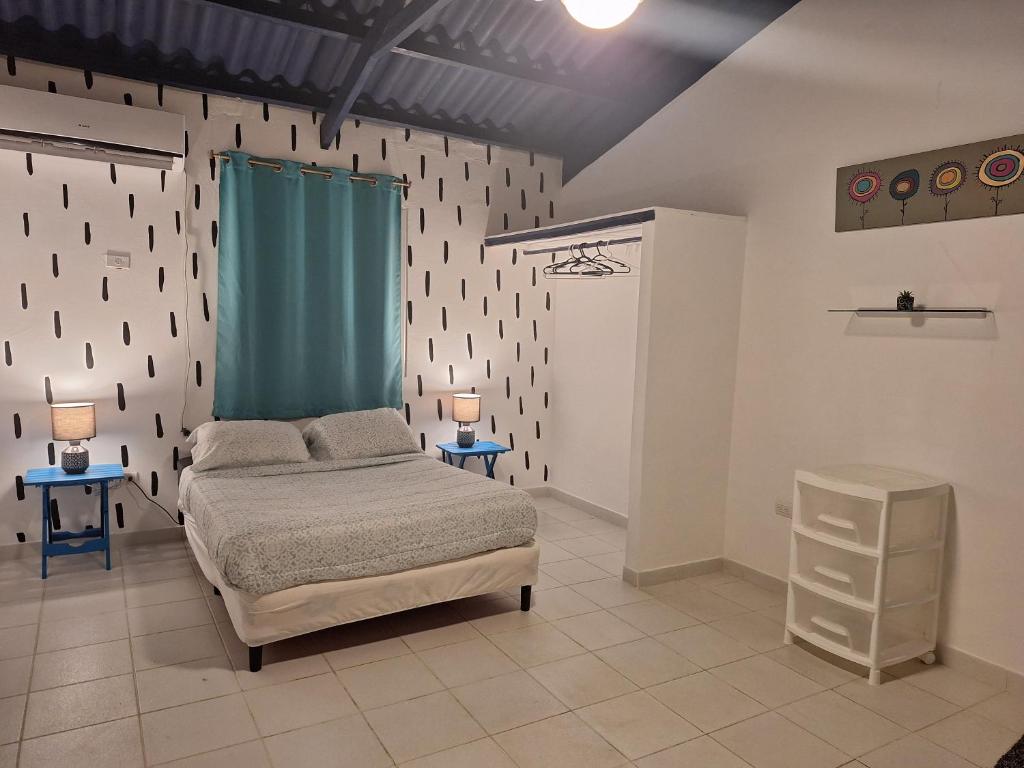 Postel nebo postele na pokoji v ubytování Cabañas Blue
