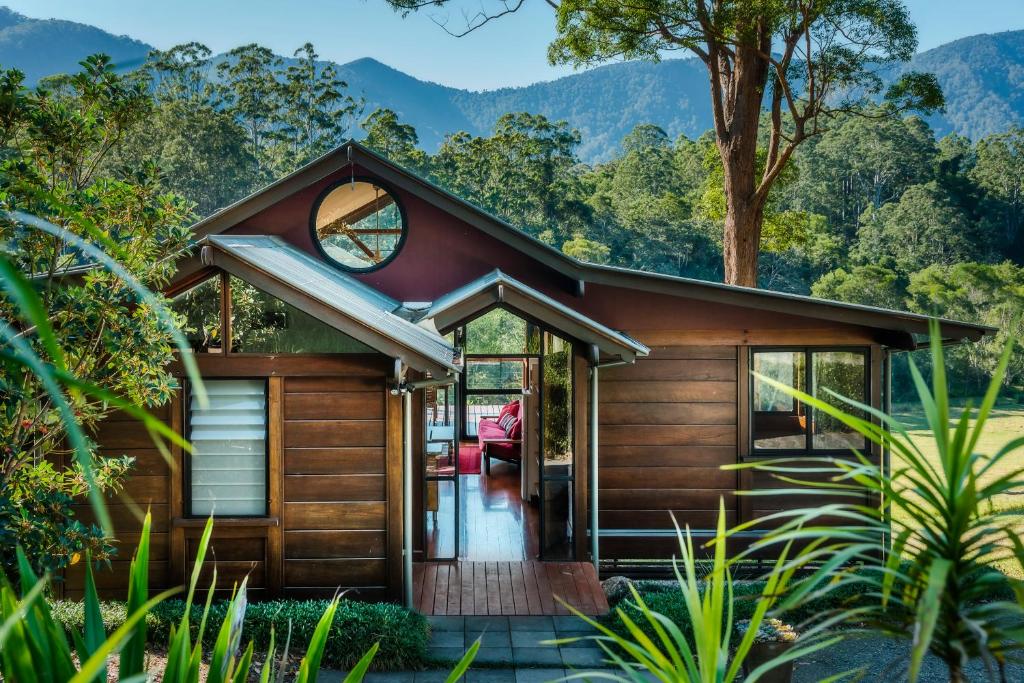 a house with a view of the mountains at Promised Land Retreat in Bellingen