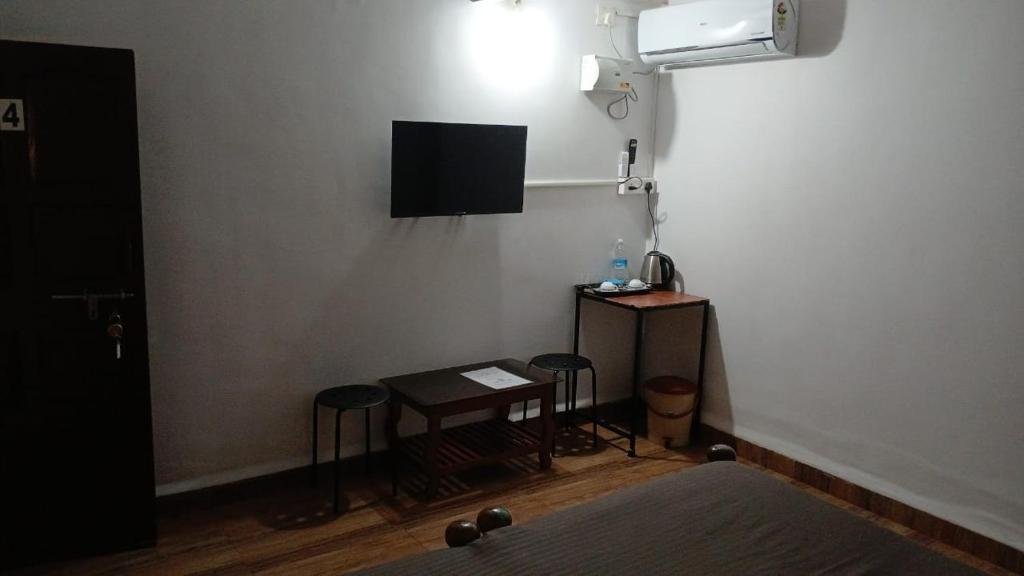 TV a/nebo společenská místnost v ubytování Casa Hillary Guest House