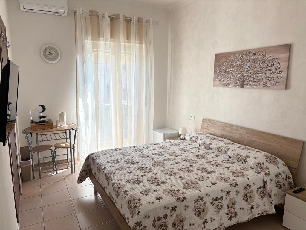 Postel nebo postele na pokoji v ubytování Valentina's Verona