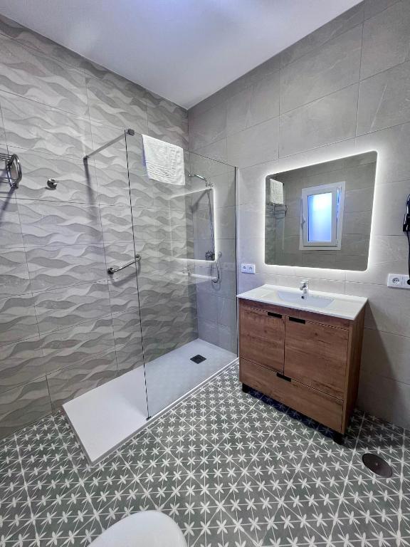 Łazienka w obiekcie Hostal El Faro