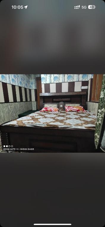 a picture of a bed in a room at Hotel sindh view and restaurant in Kulan