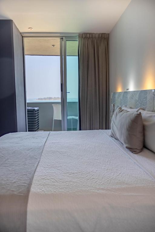 Postel nebo postele na pokoji v ubytování Hotel Punta Azul