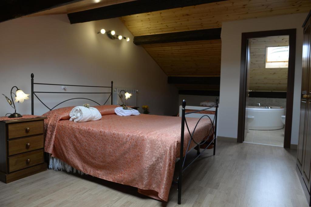 Posteľ alebo postele v izbe v ubytovaní B&B San Leonardo