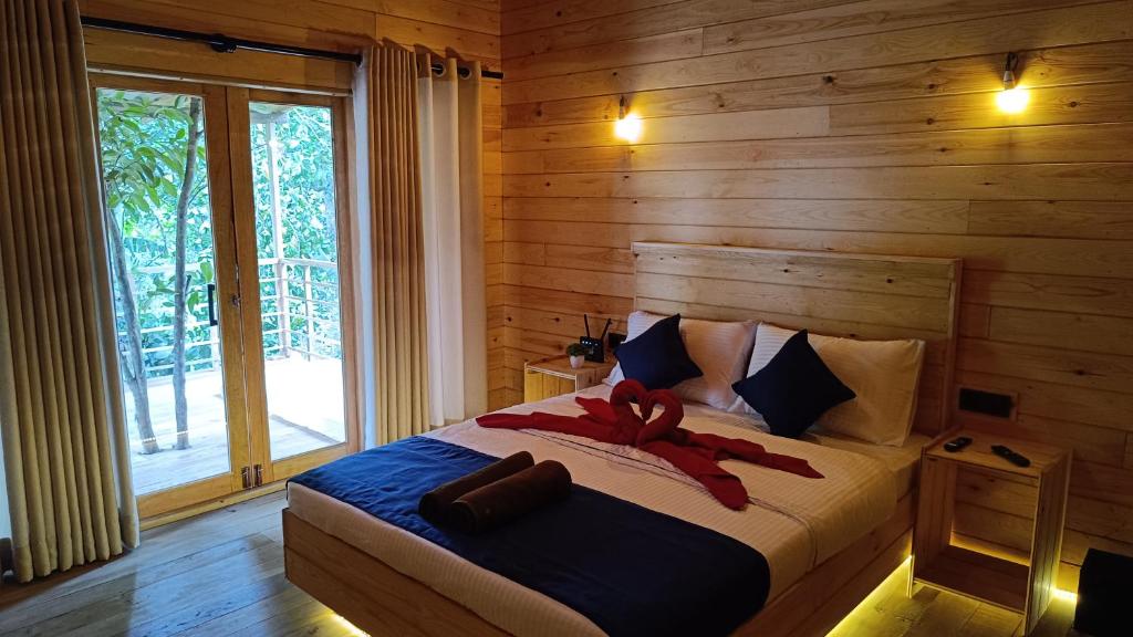 Postel nebo postele na pokoji v ubytování Wood Chalets Ella