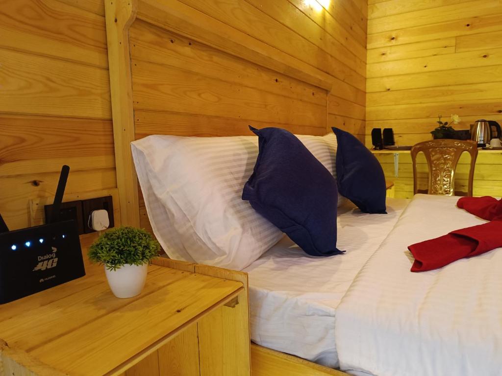 Postel nebo postele na pokoji v ubytování Wood Chalets Ella