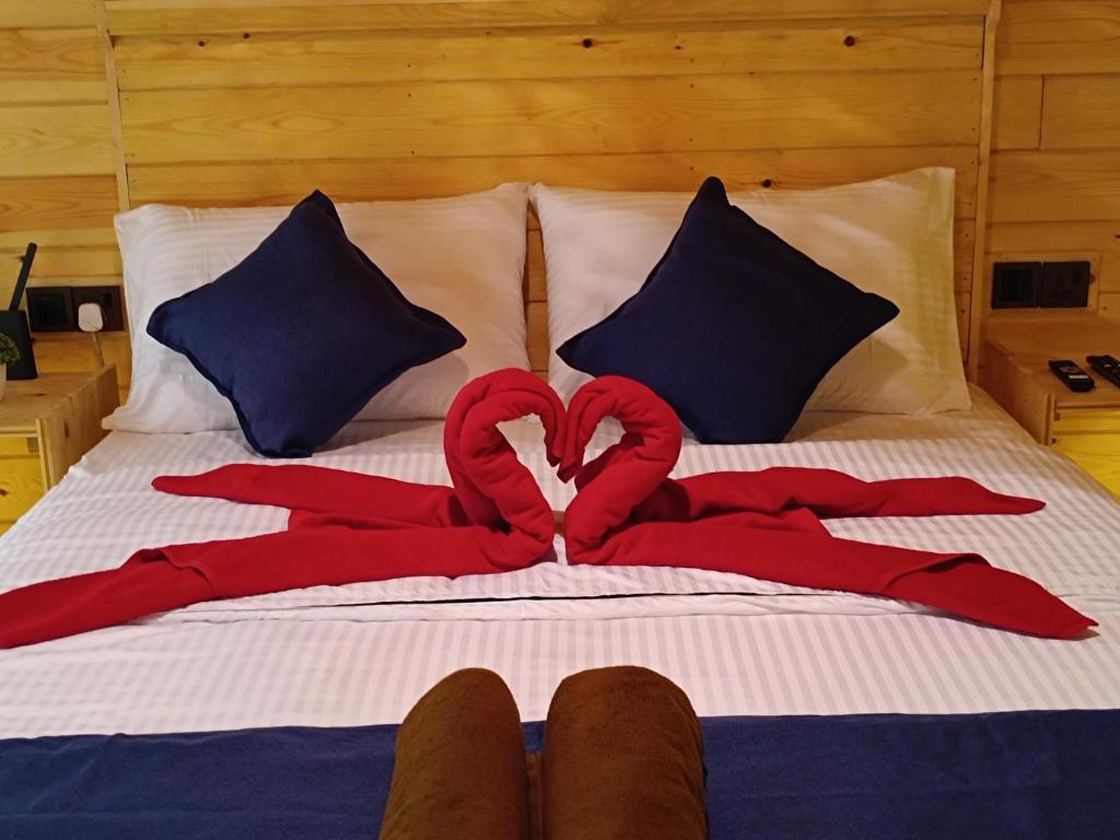 Postel nebo postele na pokoji v ubytování Wood Chalets Ella