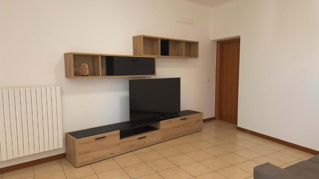 TV a/nebo společenská místnost v ubytování GM Apartment