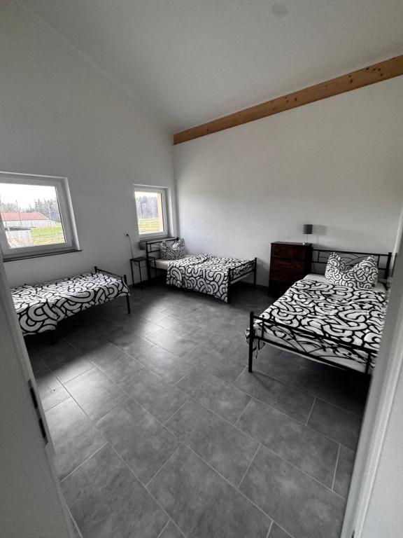 Postel nebo postele na pokoji v ubytování Bade Homes