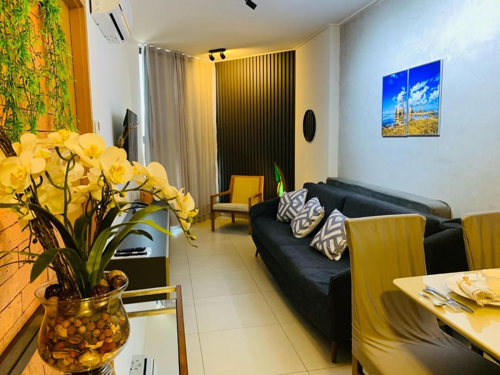 Posezení v ubytování Quarto e Sala na Ponta Verde e Pajuçara