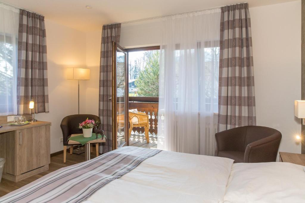Postel nebo postele na pokoji v ubytování Gästehaus Funk