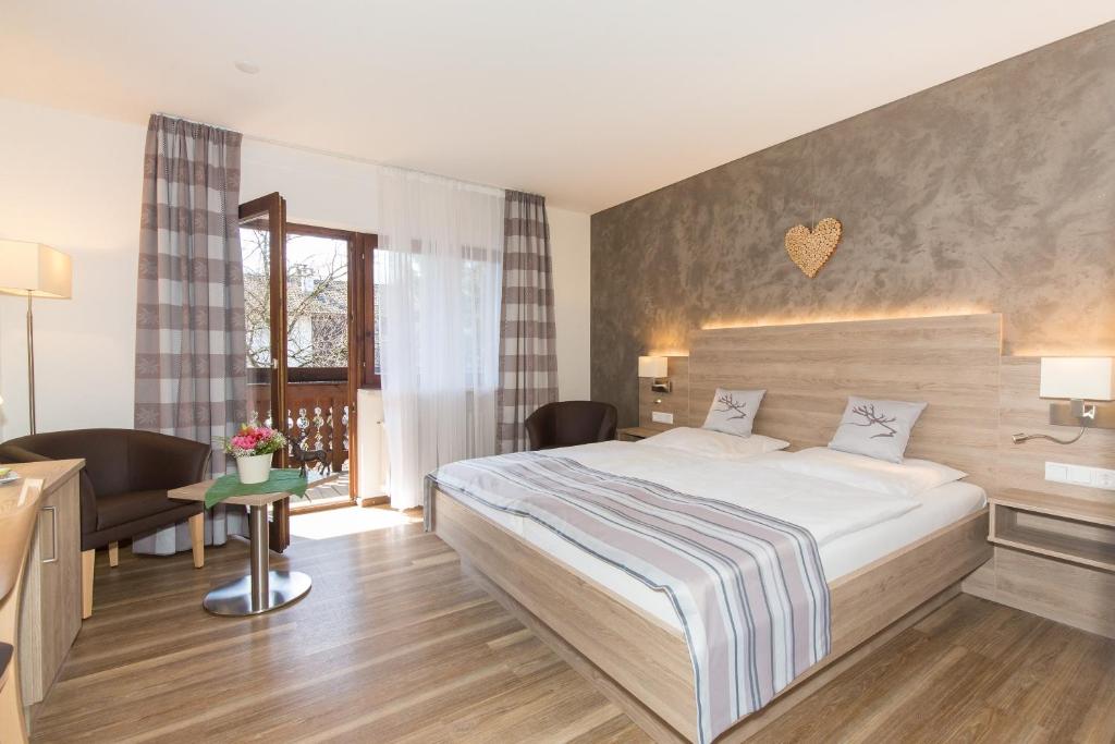 Postel nebo postele na pokoji v ubytování Gästehaus Funk