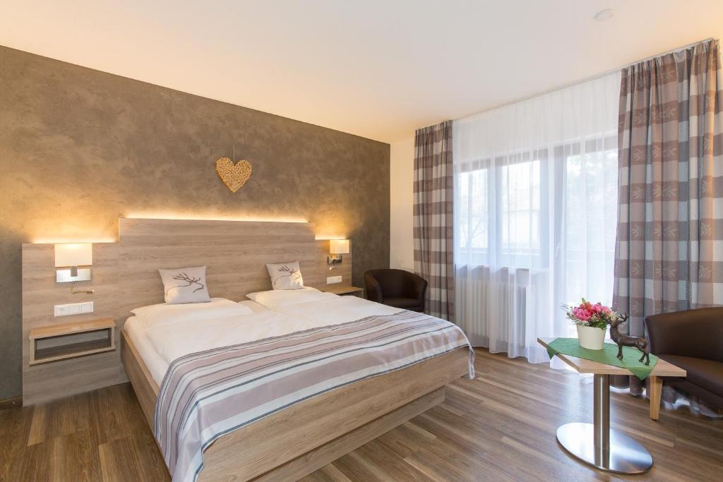 Postel nebo postele na pokoji v ubytování Gästehaus Funk