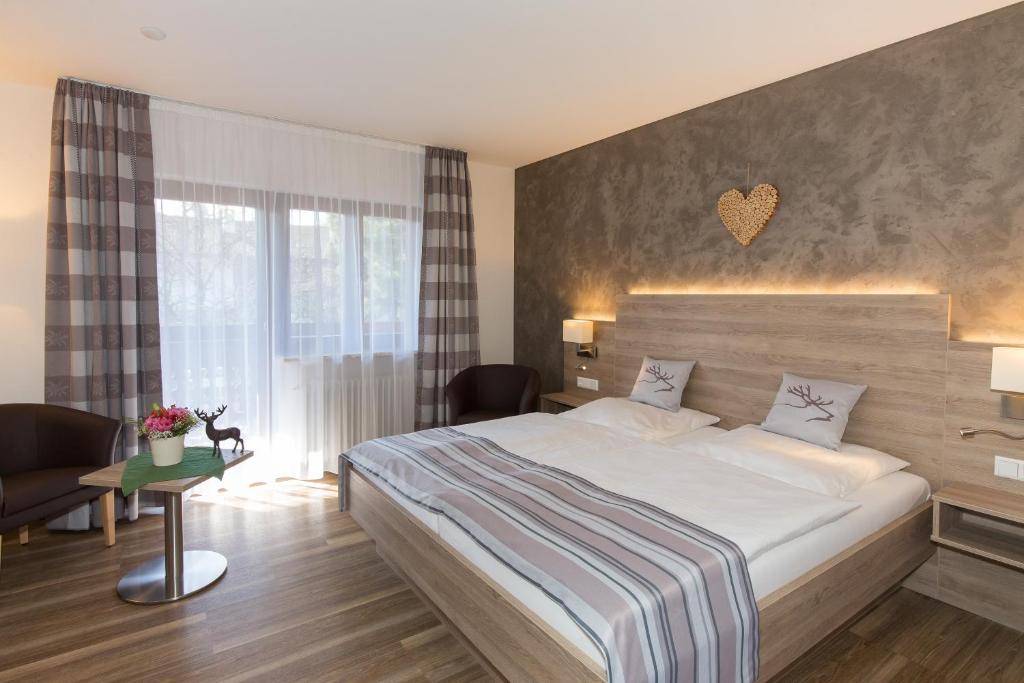 Postel nebo postele na pokoji v ubytování Gästehaus Funk