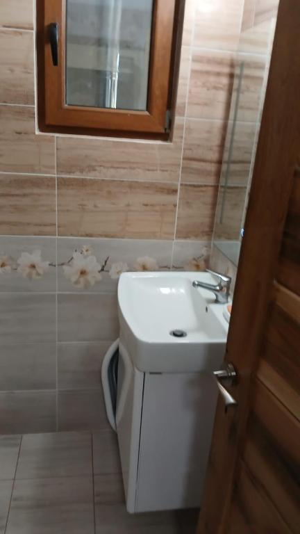 Koupelna v ubytování Cabana Ene Strada Poienari nr 13 A