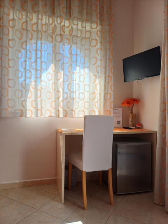 TV a/nebo společenská místnost v ubytování Zefiro B&B