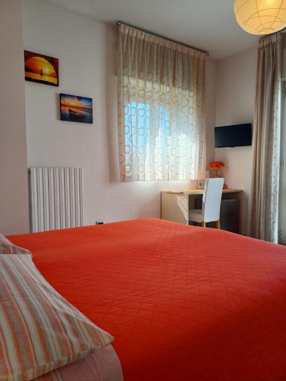 Postel nebo postele na pokoji v ubytování Zefiro B&B