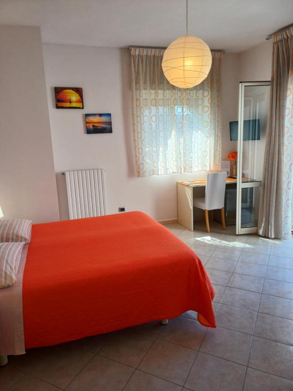 Postel nebo postele na pokoji v ubytování Zefiro B&B