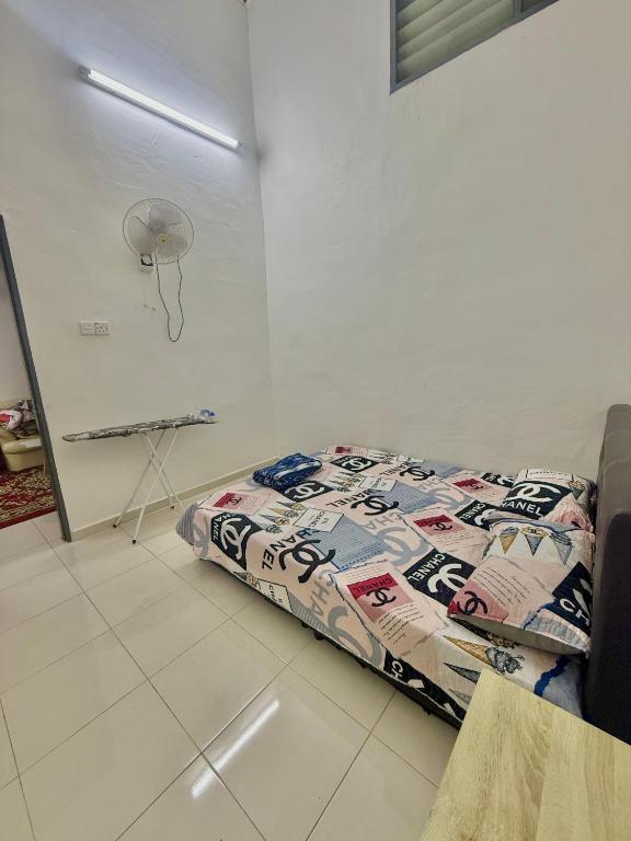 Postel nebo postele na pokoji v ubytování Best homestay in Kuala Perlis