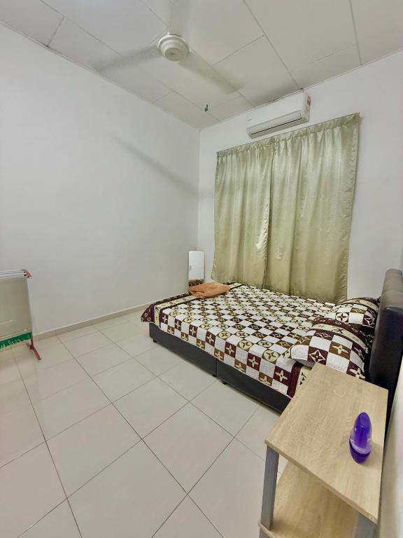 Postel nebo postele na pokoji v ubytování Best homestay in Kuala Perlis