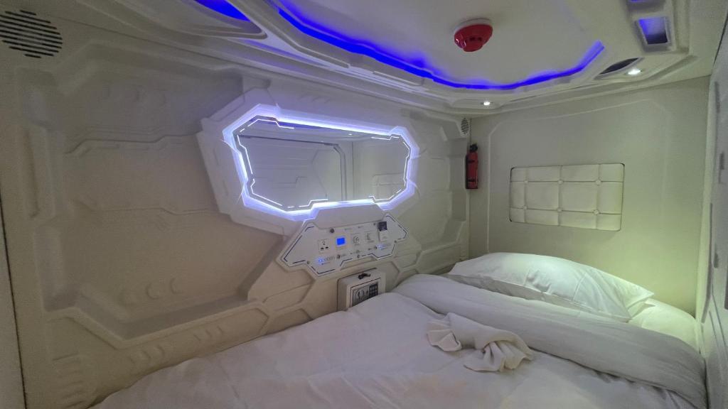 Postel nebo postele na pokoji v ubytování Golden mango home Youth hostel 金芒果之家青年旅舍