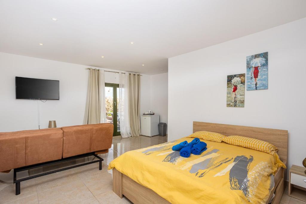 Postel nebo postele na pokoji v ubytování Villa Mosta