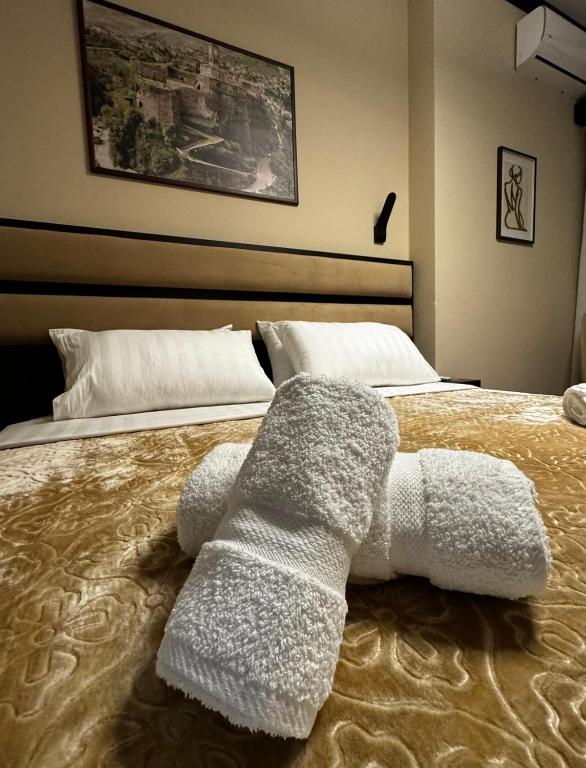 Postel nebo postele na pokoji v ubytování Guest House Shtaka