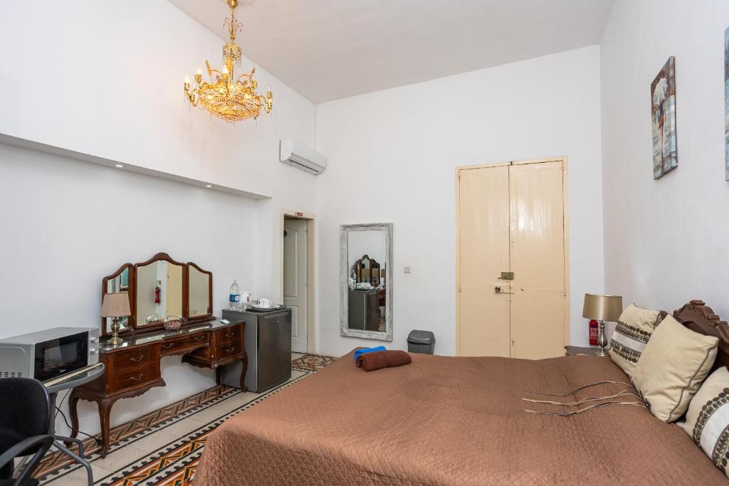 Postel nebo postele na pokoji v ubytování Villa Mosta