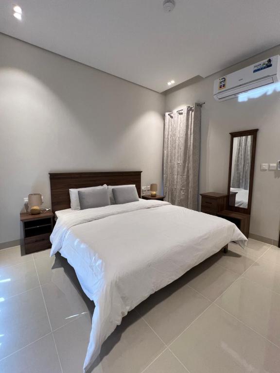 Postel nebo postele na pokoji v ubytování Sifahbeachfront Apartment
