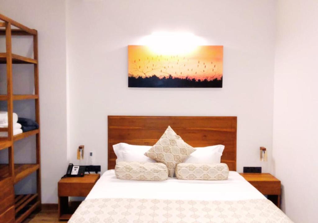 Postel nebo postele na pokoji v ubytování Diyakawa Boutique Hotel